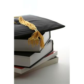 Graduation Cap on Books
