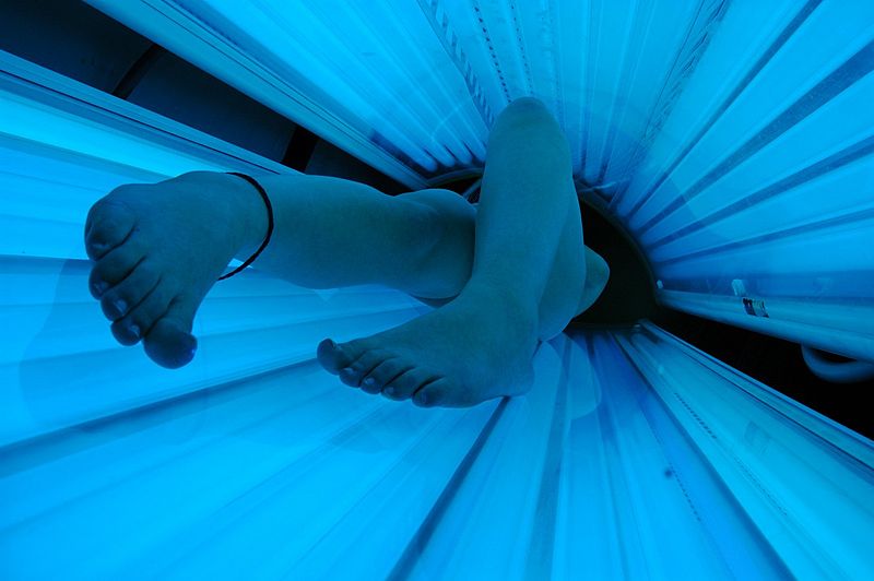 Person Using Tanning Bed