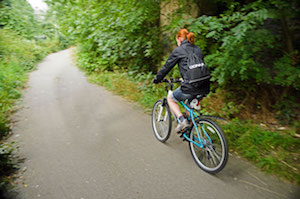 Woman Bicycling